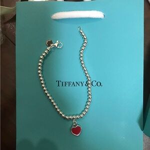 Tiffany & Co. Silver Beaded Bracelet with Red Heart Charm